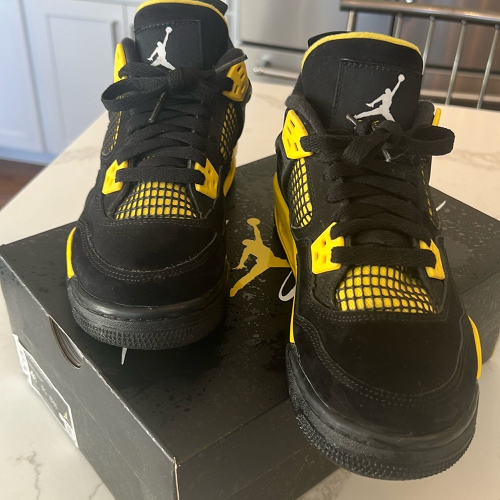 Air Jordan Thunder Retro 4 Sneakers
Excellent clean condition inside and out.